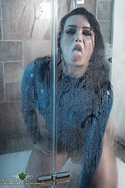 Bianka takes a shower while wearing a latex dress