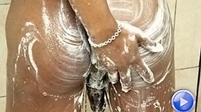 Precious smears the soap on her juicy ass imagining cum while showering